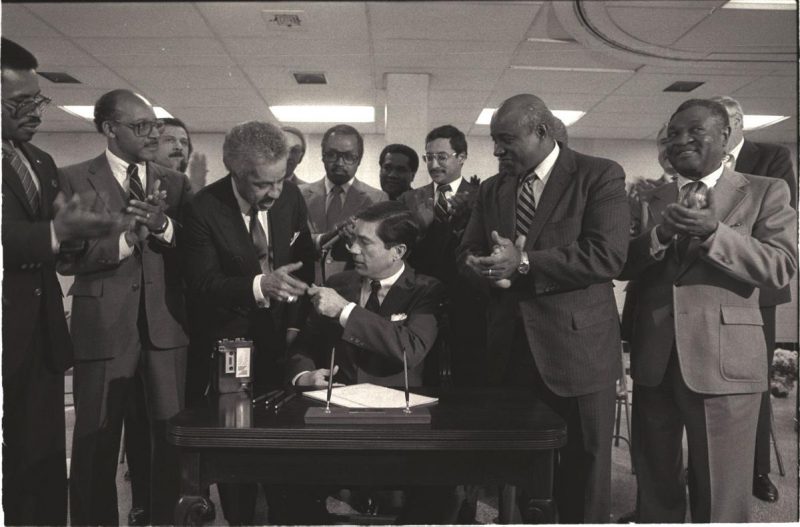 Wilder at MLK signing with Virginia Governor, Charles Robb