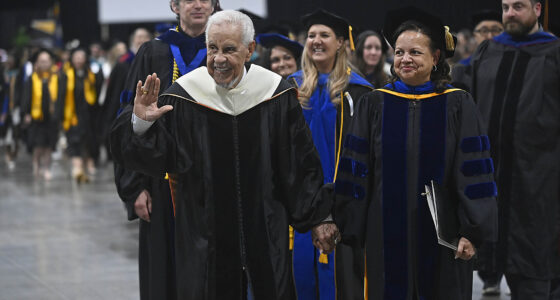 Virginia 66th Governor L. Douglas Wilder and Wilder School Dean Susan T. Gooden lead the graduating Class of 2026 during commencement.