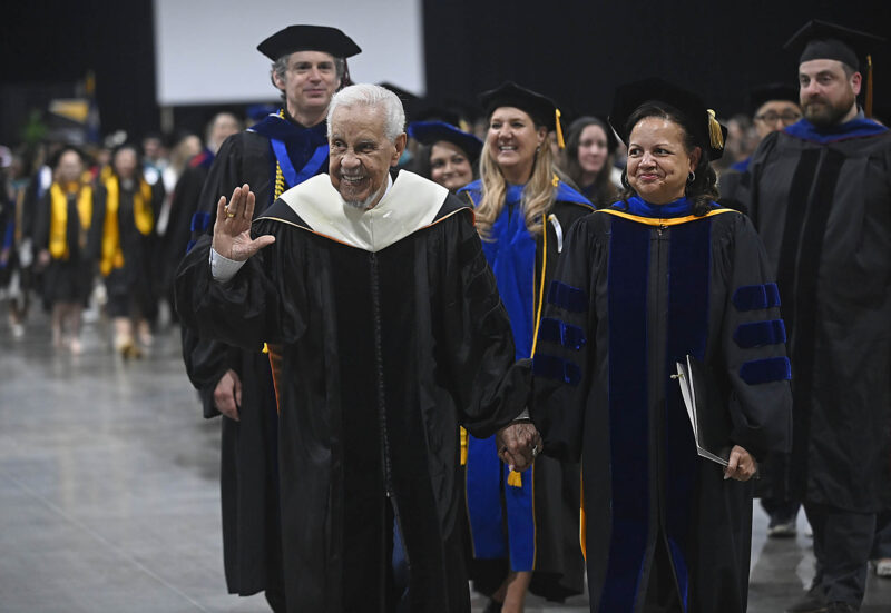 Virginia 66th Governor L. Douglas Wilder and Wilder School Dean Susan T. Gooden lead the graduating Class of 2026 during commencement.